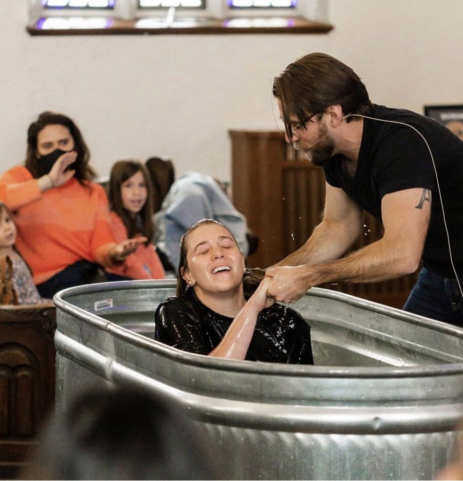 Siani Null is baptized by pastor Rob Maine.  This photo is being used for non-commercial purpose and not in connection with selling a good or service.